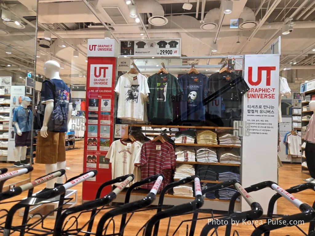 Uniqlo store interior at DUNDUN Dongdaemun 1st floor showing UT graphic tees blazers and full collection