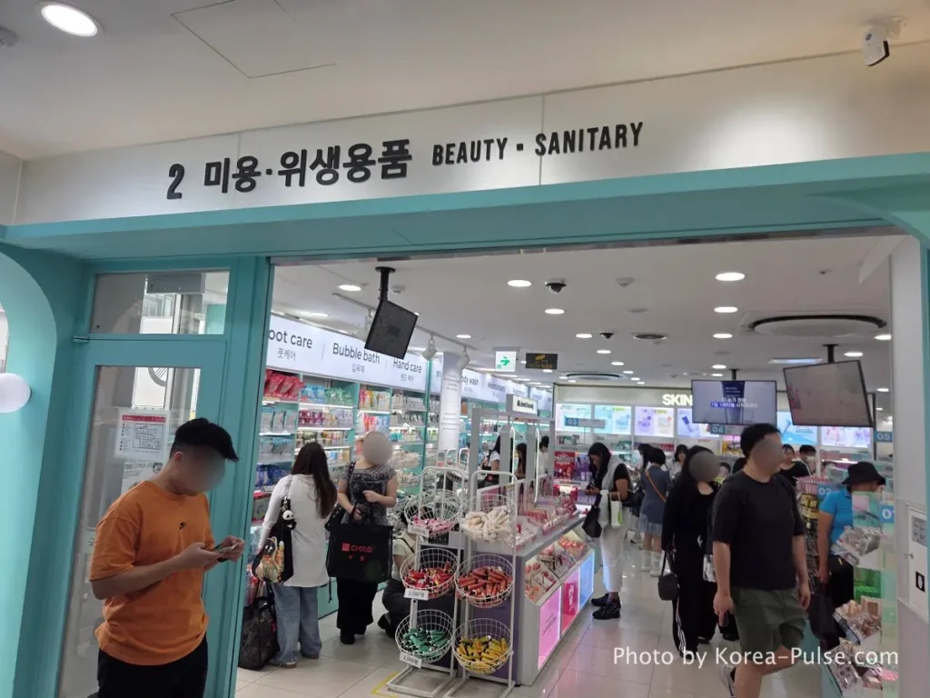 Daiso Myeongdong, Floor by FloorA 12-Story Shopping Survival Guide 5 Daiso Myeongdong Station branch 2nd floor beauty and sanitary section entrance sign Seoul