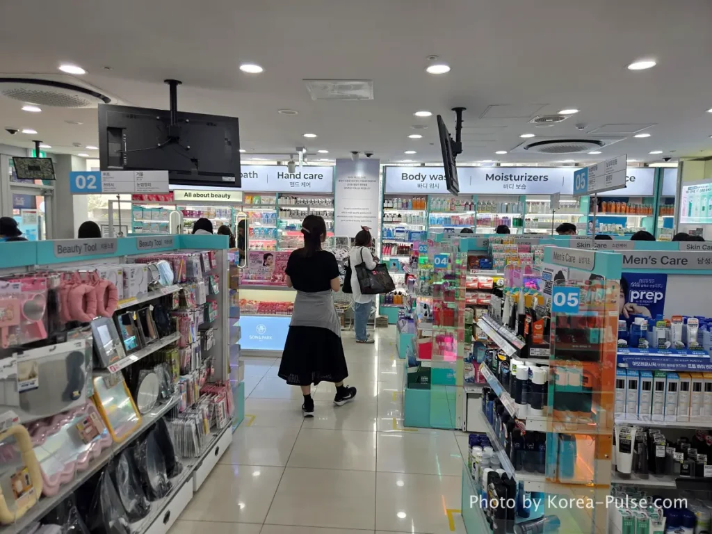 Daiso Myeongdong, Floor by FloorA 12-Story Shopping Survival Guide 6 Crowded beauty products display aisles on 2nd floor Daiso Myeongdong Station branch Seoul
