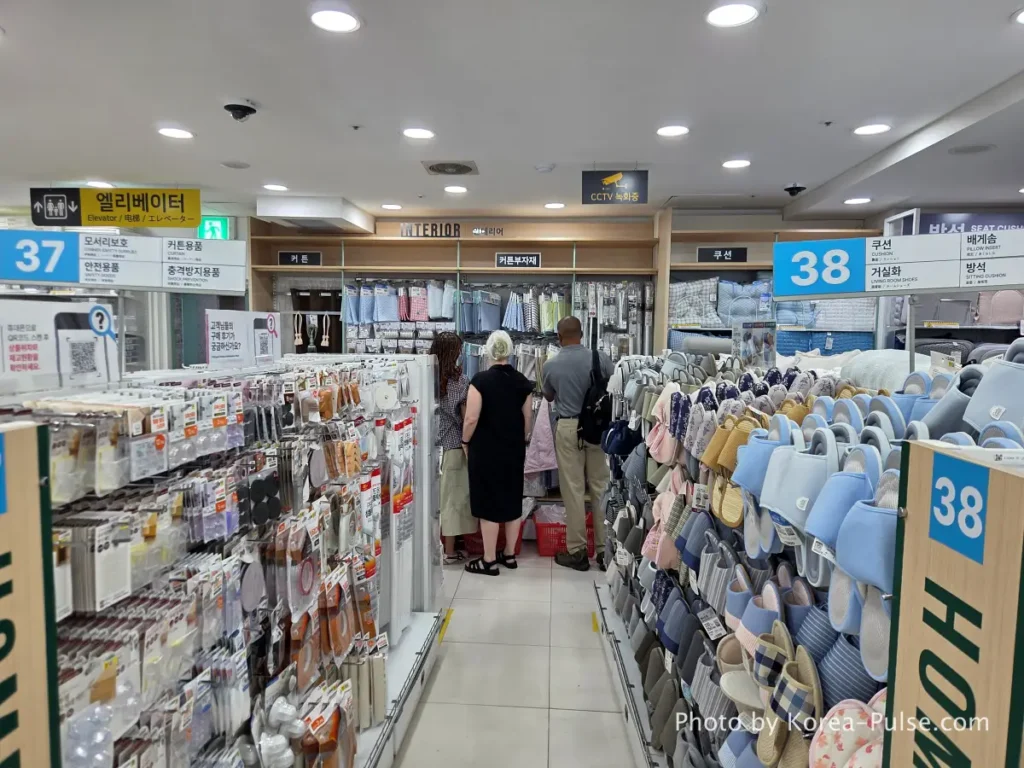 Daiso Myeongdong, Floor by FloorA 12-Story Shopping Survival Guide 18 Interior section curtains cushions and indoor slippers display on 7th floor Daiso Myeongdong Station branch Seoul