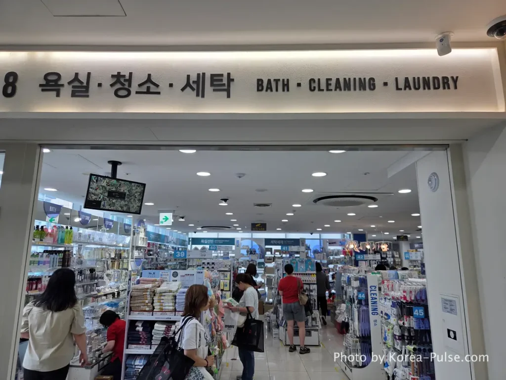 Daiso Myeongdong, Floor by FloorA 12-Story Shopping Survival Guide 19 Daiso Myeongdong Station branch 8th floor bath cleaning and laundry section entrance sign Seoul
