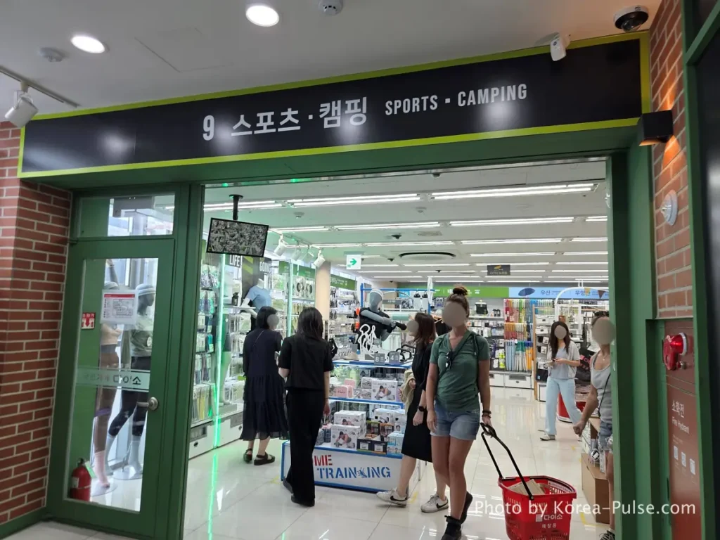 Daiso Myeongdong, Floor by FloorA 12-Story Shopping Survival Guide 21 Daiso Myeongdong Station branch 9th floor sports and camping section entrance sign Seoul