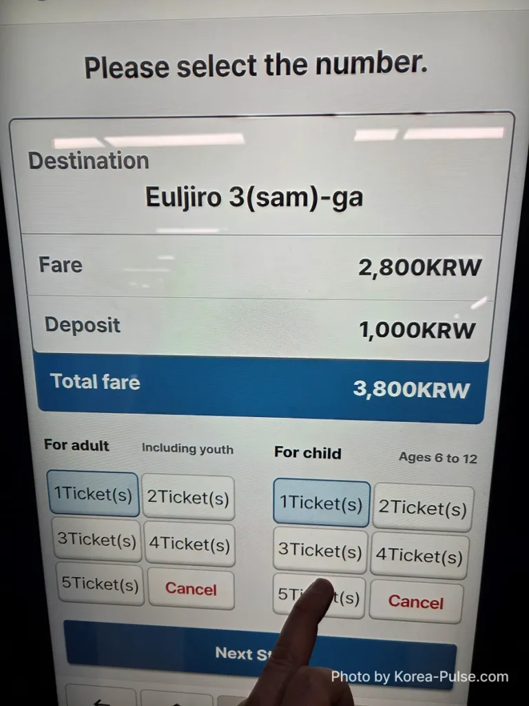 Seoul Metro ticket machine showing fare breakdown for single journey ticket — adult fare, child fare, deposit, and total amount in Korean won