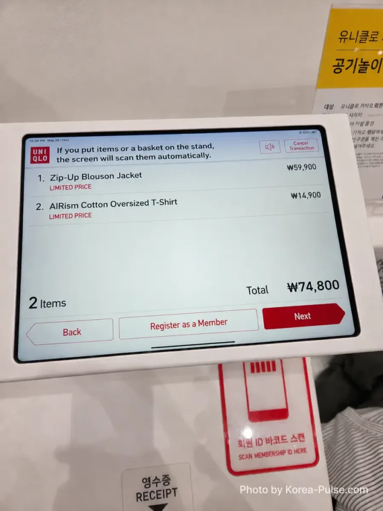 Uniqlo Thank You Festival in Seoul: I Went for One Thing and Bought Another (No Regrets) 9 Uniqlo self-checkout screen showing the final purchase of a Zip-Up Blouson Jacket at 59,900 won and an AIRism Cotton Oversized T-Shirt at 14,900 won, totaling 74,800 won, with both items marked as Limited Price