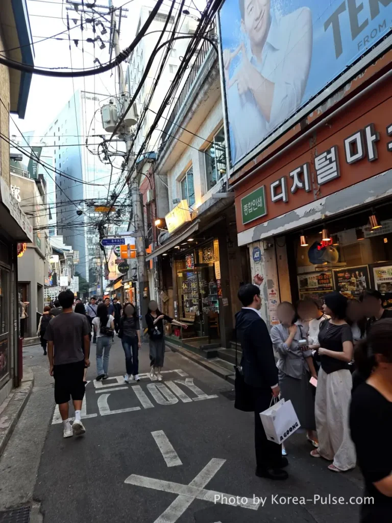 Hipjiro main alley Euljiro Seoul Friday evening crowds office workers food