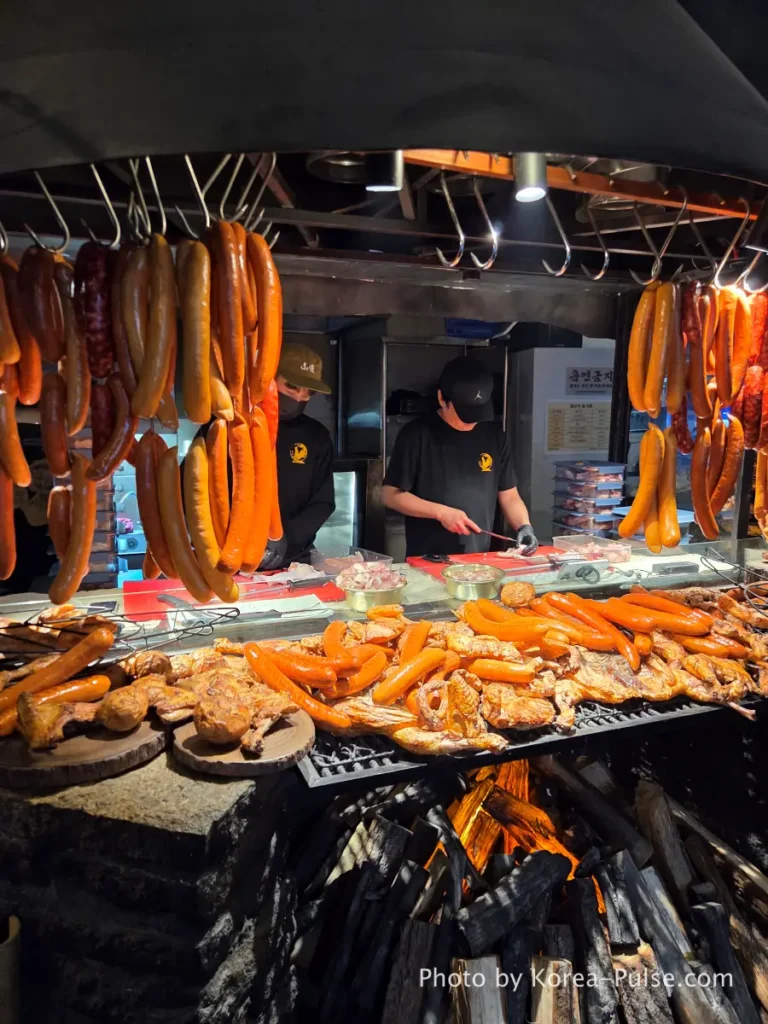 Dalmaji Plaza BBQ hanging sausages charcoal fire chicken Euljiro yajangs Seoul