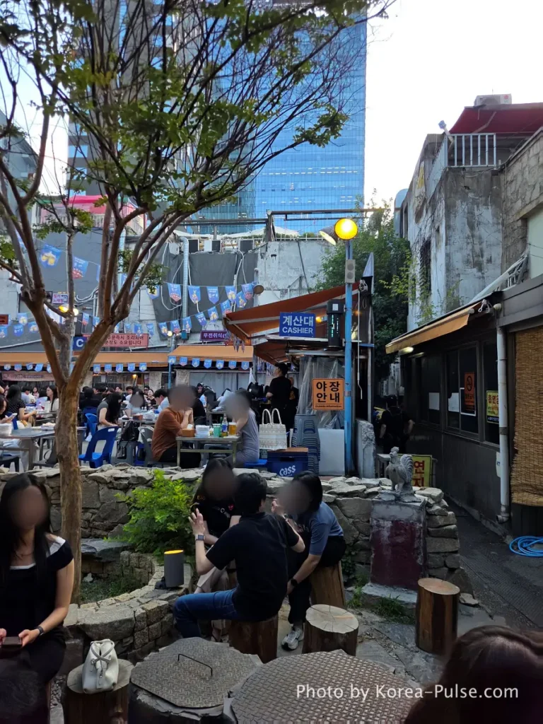 Dalmaji Plaza BBQ outdoor yajang area Seoul with cashier sign and pick-up zone