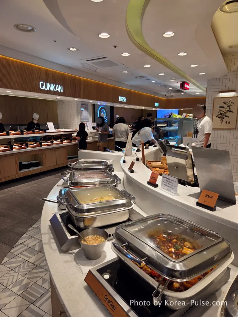 The 120-Dish Question: Inside QooQoo, Korea's Sushi Buffet Phenomenon 5 Center zone left side with palbochae tteokgalbi and fried rice at QooQoo